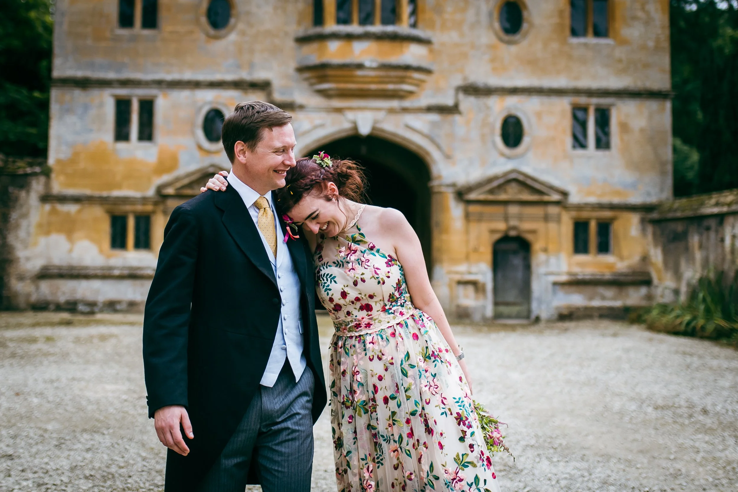 Bride and groom at historic building